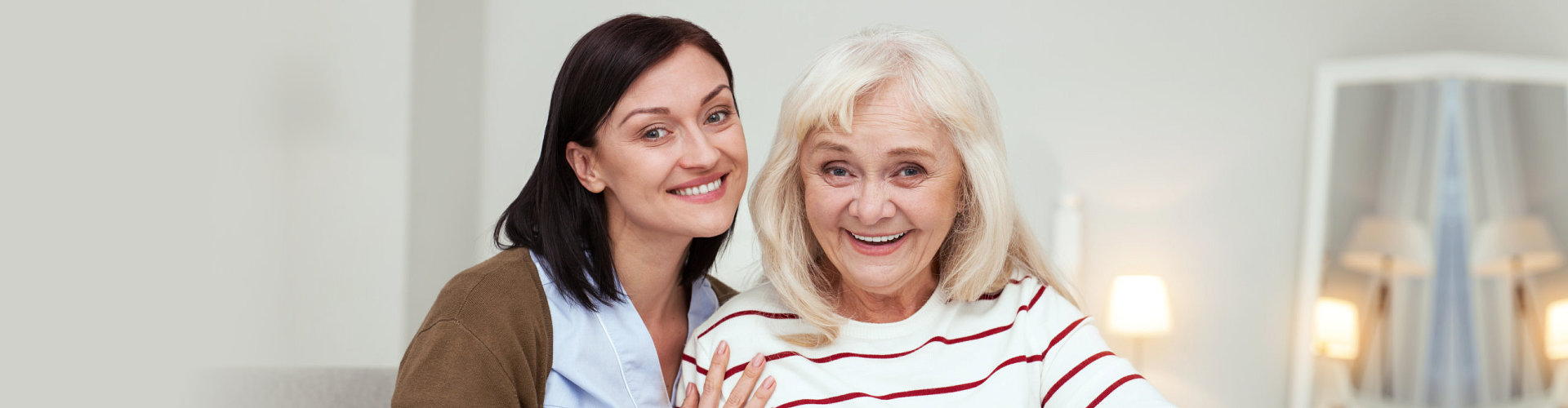 middle aged woman together with an elderly woman